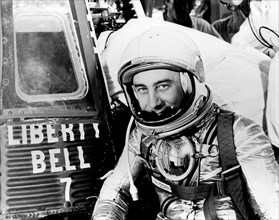 Astronaut Grissom on level 3 in front of Liberty Bell 7 capsule ca. 1961