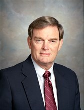 Portrait of Thomas Jack Lee, sixth director of the Marshall Space Flight Center from July 6, 1989 to January 6, 1994.