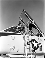 (1961) Astronaut John H. Glenn Jr. in the cockpit of a T-106.