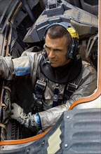 (9 April 1966) Astronaut Eugene A. Cernan, prime crew pilot of the National Aeronautics and Space Administration's Gemini-9 spaceflight, sits in Gemini Boiler-plate during water egress training activi...