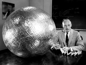 Engineer W.J. O'Sullivan, Jr. with 30 Inch Subsatellite ca. 1957