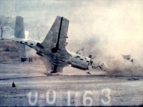 Researchers at the National Advisory Committee for Aeronautics (NACA) Lewis Flight Propulsion Laboratory purposely wreck a McDonnell FH-1 Phantom as part of the laboratory’s Crash Fire Program. ca. 19...