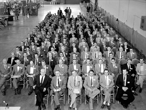 Attendees listen during the May 22, 1956 Inspection of the new 10- by 10-Foot Supersonic Wind Tunnel at the National Advisory Committee for Aeronautics (NACA) Lewis Flight Propulsion Laboratory.