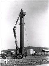 A Redstone missile being erected.