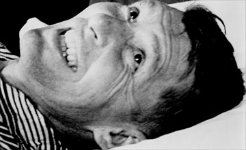 Astronaut Walter Schirra smiles during post-flight physcial