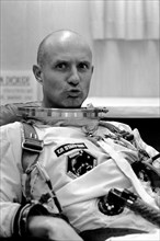 (12 Dec. 1965) Astronaut Thomas P. Stafford, pilot, makes a facial gesture at the camera while suiting up in Launch Complex 16 trailer during Gemini-6 prelaunch countdown.