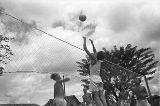 Dutch soldiers playing volleyball in Indonesia, Dutch East Indies ca. 1949