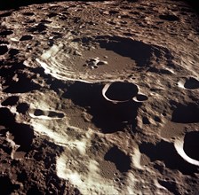 (16-24 July 1969) An oblique of the Crater Daedalus on the lunar farside as seen from the Apollo 11 spacecraft in lunar orbit. The view looks southwest