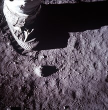 (20 July 1969) A close-up view of an astronaut's boot and bootprint in the lunar soil, photographed with a 70mm lunar surface camera during the Apollo 11 lunar surface extravehicular activity (EVA).