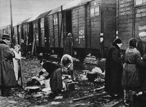 Warsaw Uprising - German Transit Camp in Pruszków (Dulag 121). Transport with expelled Polish civilians leaves the camp ca. 1944