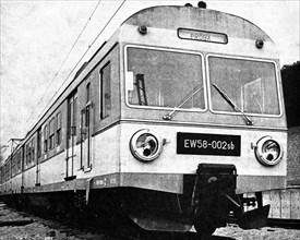 The EW58-002 electric multiple unit intended for the Fast Urban Railway in the Tri-City stands before or after the test drive on the entry track to the then Central Railway Research and Development Ce...