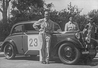 Wojciech Kolaczkowski at the DKW car is waiting for the start of the 1937 Polish Rally ca. 1937