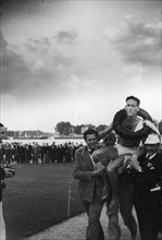 European champion Roger Verey being carried ca. 1935