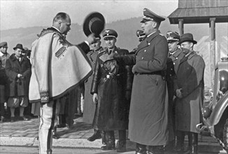Chairman of the Highlanders Committee Waclaw Krzeptowski (left) greets Governor Hans Frank after arriving in Zakopane ca. 1939