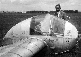 JN-1 glider, the designer stands next to the glider ca. 1932