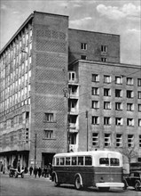 Warsaw Poland street scene with bus and traffic ca. 1950