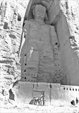 View of the taller Bamiyan Buddha statue, known as Salsal, standing in his giant niche ca. 1928