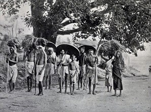 People travelling on the Grand Trunk Road by foot in Bangledesh (at the time taken, this was possibly India) ca. 1910
