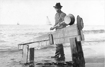 Miner washing gold 1900-1930