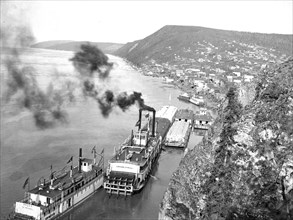 Riverboats distant view of town 1900-1923 possibly Ruby, Alaska yukon river