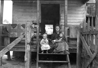 Mrs. L. Bosher, living in a run down cotton mill village, June 1911