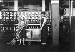 Ronald Webb, 12 years old, a doffer boy, and Frank Robinson, 7 year old who helps sweep and doff, May 1911