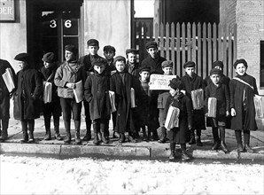 Waiting for their papers. 3 of these were 8 years old. Some were 9 years old. Hartford, Conn, March 1909