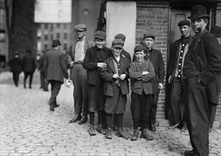 Workers in Merrimac Mill. Robert, smallest, 12 years old, October 1911
