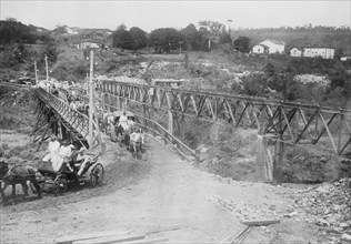 Roosevelt crossing Paranapanema River, Minas, Brazil ca. 1913