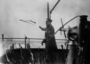 Throwing Guns into sea ca. 1910-1915