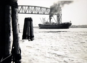 Cargo Ship SS Pan Atlantic Passing under Railroad Bridge, Cape Cod Canal 1/23/1938