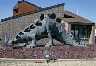 1990s United States -  Stegosaurus statue at town hall, Route 64, Dinosaur, Colorado 1991