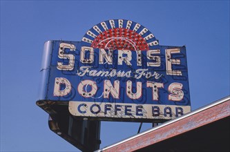 2000s America -  Sunrise [ie Sonrise] Donuts neon sign, Springfield, Illinois 2003