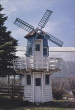 1980s United States -  Windmill at Feed Mill, Prairie City, Iowa 1980