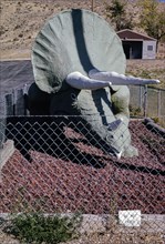 1990s United States -  Triceratops statue, public park, Route 40, Dinosaur, Colorado 1991