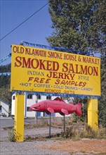 1990s America -  Old Klamath Smoke House sign, Klamath, California 1991
