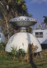 1990s United States -  Flying Saucer statue, Doll House Museum, Route 1, Valkaria, Florida 1990
