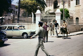 Israel April 1965: Young men crossing the street in this scene from Nazareth