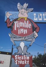 2000s America -  Tumble Inn Lounge sign, Powder River, Wyoming 2004
