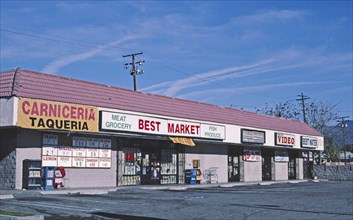 2000s America -  Strip mall in poor neighborhood (Carniceria Taqueria), San Bernardino, California 2003