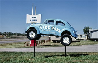 1980s United States -  Tire Barn sign, Route 50, Yankton, South Dakota 1987