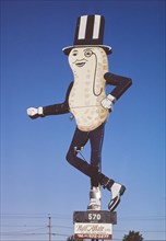 1980s United States -  Mr Peanut sign, Hair Affair sign, Route 6, Swansea, Massachusetts 1984