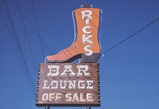 1980s America -  Rick's Bar and Liquor sign, West Fargo, North Dakota 1980