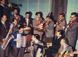 The Angelini Orchestra. Guitarist Pino Rucher is at the back (fourth from right) next to drummer Mario Maschio (third from left) ca. 1950s