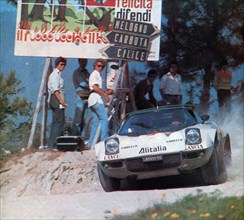 Raffaele "Lele" Pinto and co-driver Arnaldo Bernacchini on a Lancia Stratos HF (Group 4) sponsored Alitalia at Pian dei Corsi (Savona) for the 1975 Rallye Sanremo ca. October 1975