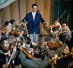 The Italian conductor Carlo Savina with the Orchestra of Rai - Radiotelevisione Italiana in 1956