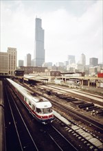 New Amtrak turboliner which now makes the passenger run between Chicago and St. Louis, Missouri, contrasts with the older smoking type engines which are now used less frequently than in the past, June...