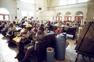 Passengers waiting for a train at the Fort Worth, Texas station, June 1974