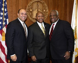 12/14/2005 - Secretary Alphonso Jackson, [center], with former Federal Communications Commission Chairman Michael Powell, [left], and U.S. Supreme Court Justice Clarence Thomas, [right], at HUD Headqu...