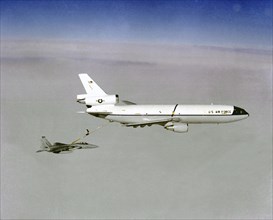 Air-to-air right side view of a KC-10A Extender aircraft